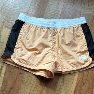 The North Face Women's Athletic Shorts in Peach and Black